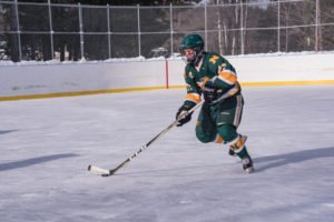 Bringing the puck down into the Mutineers end of the rink.