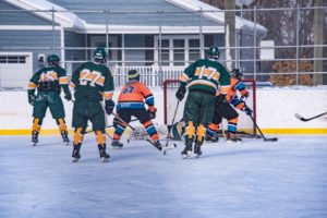 The NMU Goalie blocks another shot on net.