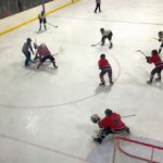 Another face-off in the Marquette Redmen's zone