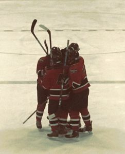 The Redmen celebrate after a goal in the second period