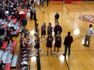 The Maroons on the sidelines during introductions.