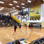 The Redettes warm up ahead of their game against the Negaunee Miners.