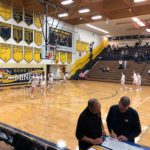 The Negaunee Miners warm up.