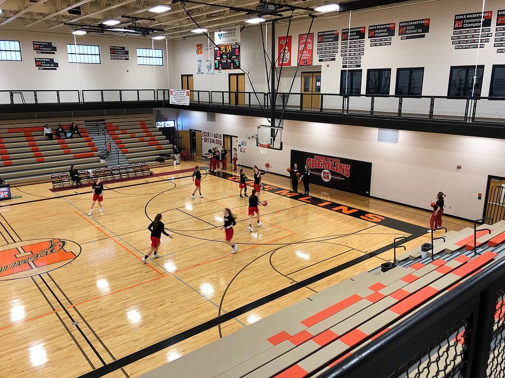 The Redettes warm up ahead of their game against the Gremlins.