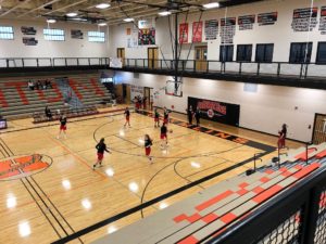 The Redettes warm up ahead of their game against the Gremlins.