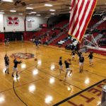 The Redettes warm up.
