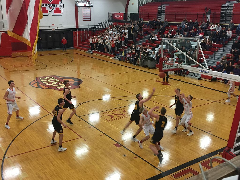 Some action under the basket.