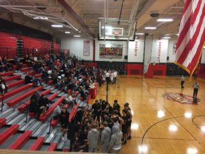 The Redmen won in overtime 74-65 over the Trojans.