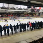 Fans take in the action.
