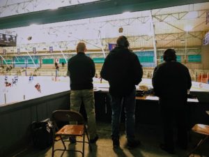 John and Joe take in the view with one of the Redmen coaches.