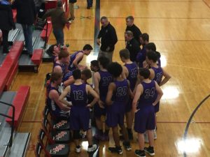The Gladstone Braves huddle up.
