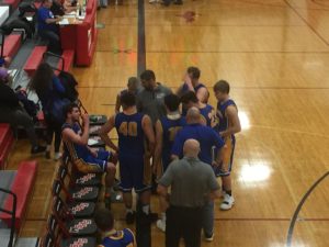 The Flivvers strategize against a dominant Redmen team.