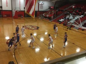 A Kingsford player drives to the basket.