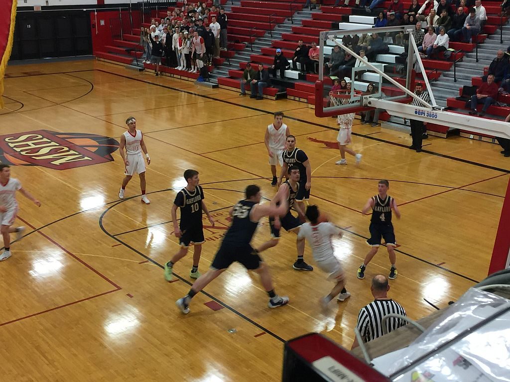 Raffy Millado goes for the lay-up.