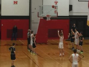 Marquette's Ogea puts up one of his many points in the game