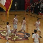 The Marquette Redmen hustle down the court to prepare on defense