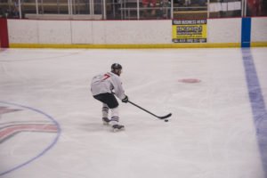The Pigs regain control of the puck.
