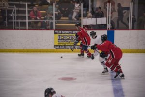 The Heat move the puck down the ice.