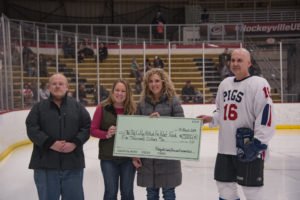 Wealth Strategy Group presenting their $5,000 check.