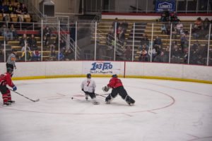 Swenor came out of goal to try to keep the Pigs from getting the puck.