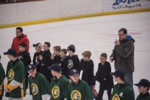The Superior Hockey State Champions and Marquette Jr. Hockey White Mites.