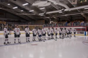 The Pigs lined up at center ice.
