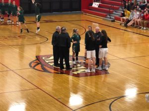 Opponents shake hands before the District Championships.