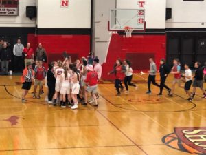 Fans rush the new District Champs!