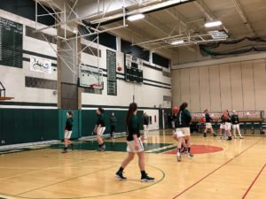Alpena warms up ahead of hosting the Redettes.