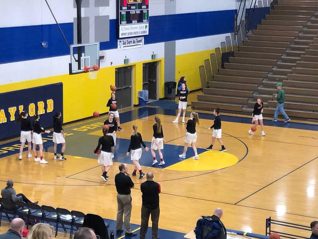 The Redettes get ready for their game against Midland Dow.