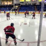 The Redmen warm up ahead of their game against the Trenton Trojans.