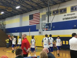 The Midland Chemics warm up for regional playoff action against Redmen.
