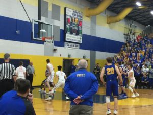 Some action under the basket.