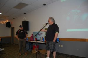 Walt Lindala giving away some door prizes.