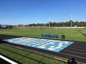 The Ishpeming Hematites warming up on the field.