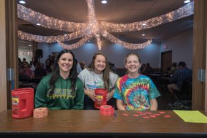 Abbie, Amy, and Madison getting everyone checked in!