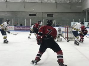 The Redmen take a shot on goal.