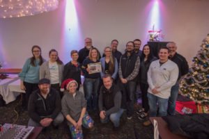 The mediaBrew Communications Staff with tonight's winner of The Living Room of Your Dreams