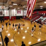 Marquette and Traverse City Central warming up before the District Title game