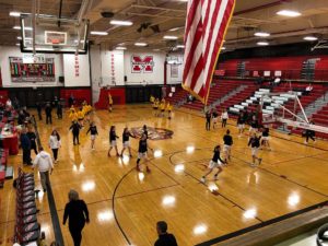 Marquette and Traverse City Central warming up before the District Title game