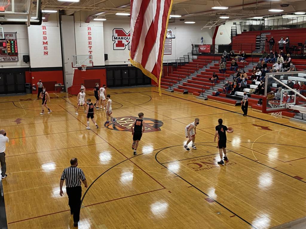 Eskymo bringing ball down court