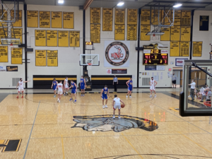 Marquette Brings Ball Down Court