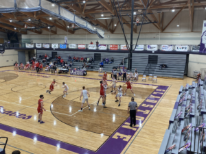 Marquette Redmen varsity boys basketball live on 103 FXD