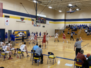 Flivvers rush in to try and defend the basket.