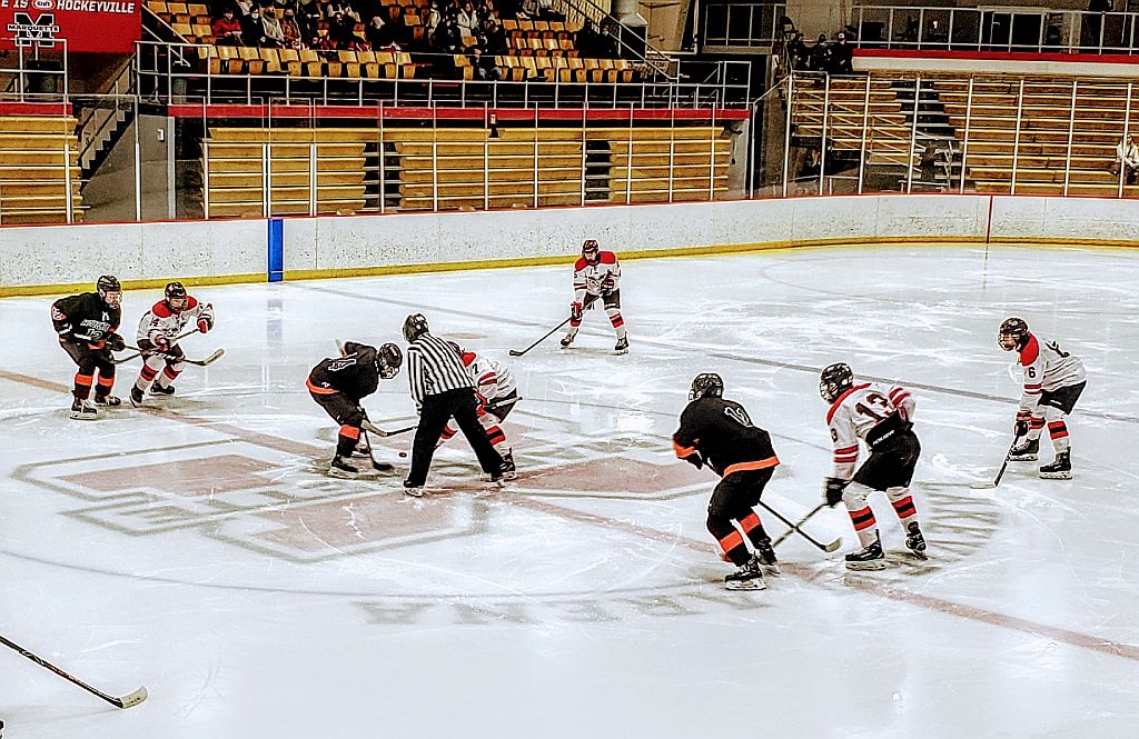 Center ice face-off.