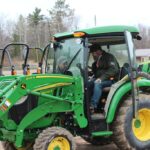 Adam had to take a spin in the tractor