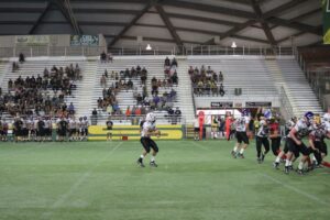Black has the ball, ready to throw