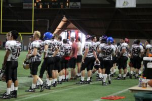 Black Team on the sidelines