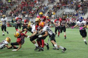 An overwhelming tackle by Black Team