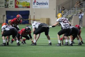 Black team in posession of the ball